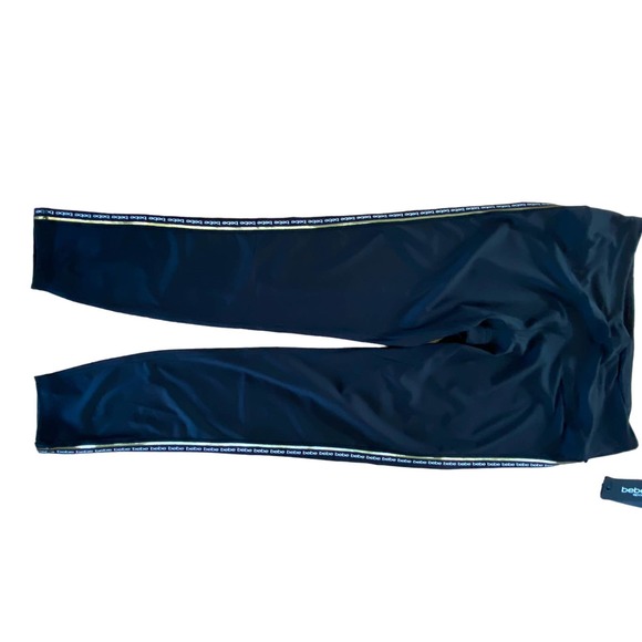 Bebe leggings with gold striping down legs classic Bebe logo repeated - Picture 4 of 9